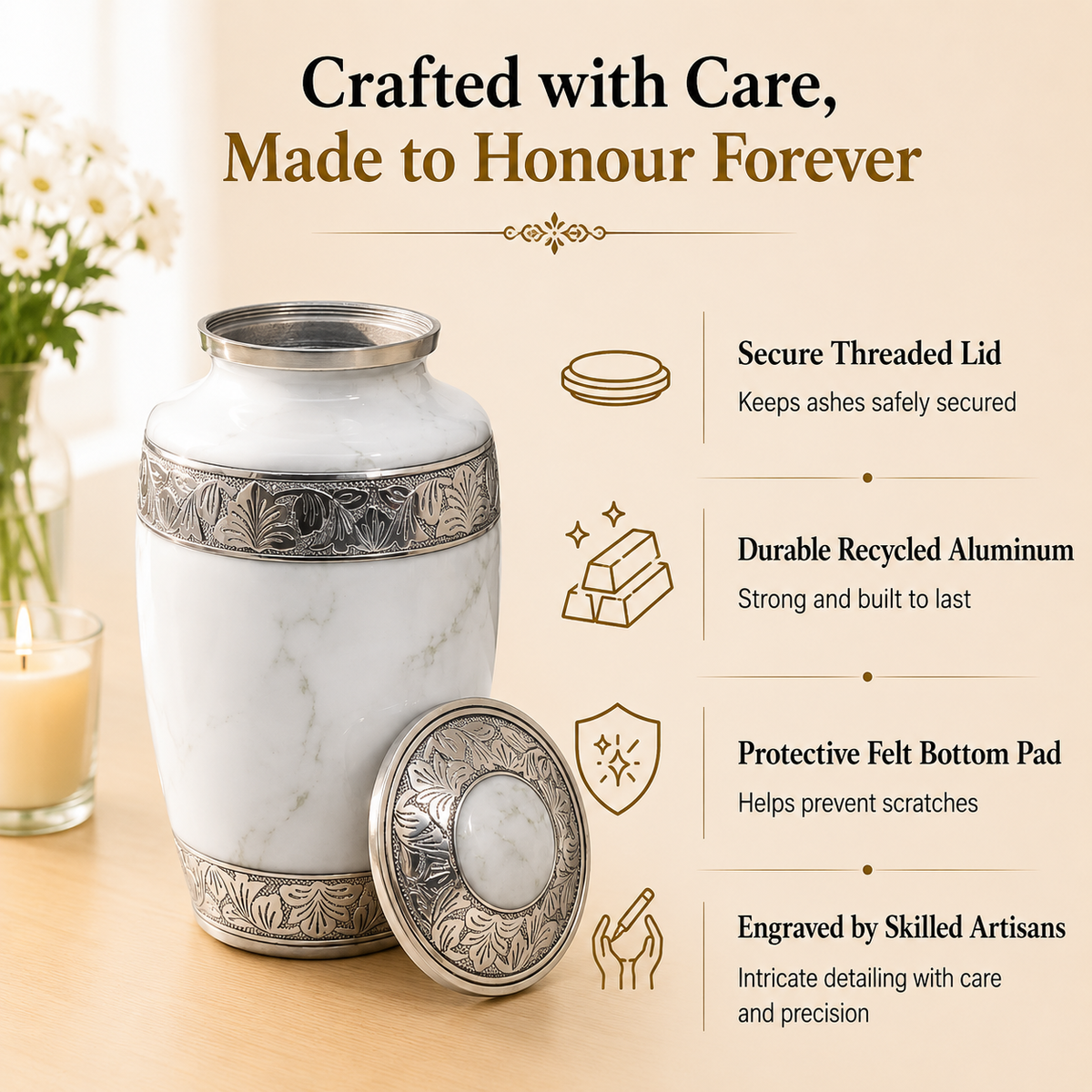 A white marble-look cremation urn with ornate silver metal bands and a matching silver lid placed beside it on a light wooden surface. 